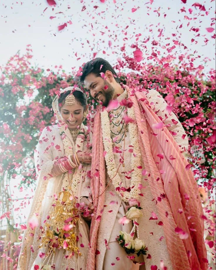 Couple Wedding image in background flower petals flying- mehdi event